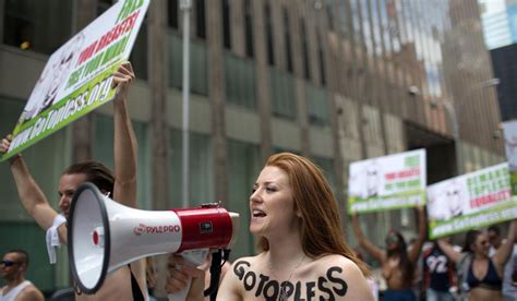 GoTopless: Topless protestors free the nipple in 60 cities ...